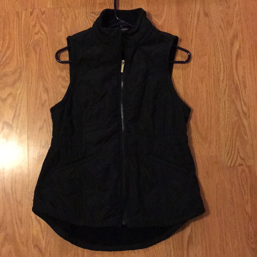 Black fitted vest; quilted pattern; great shape
